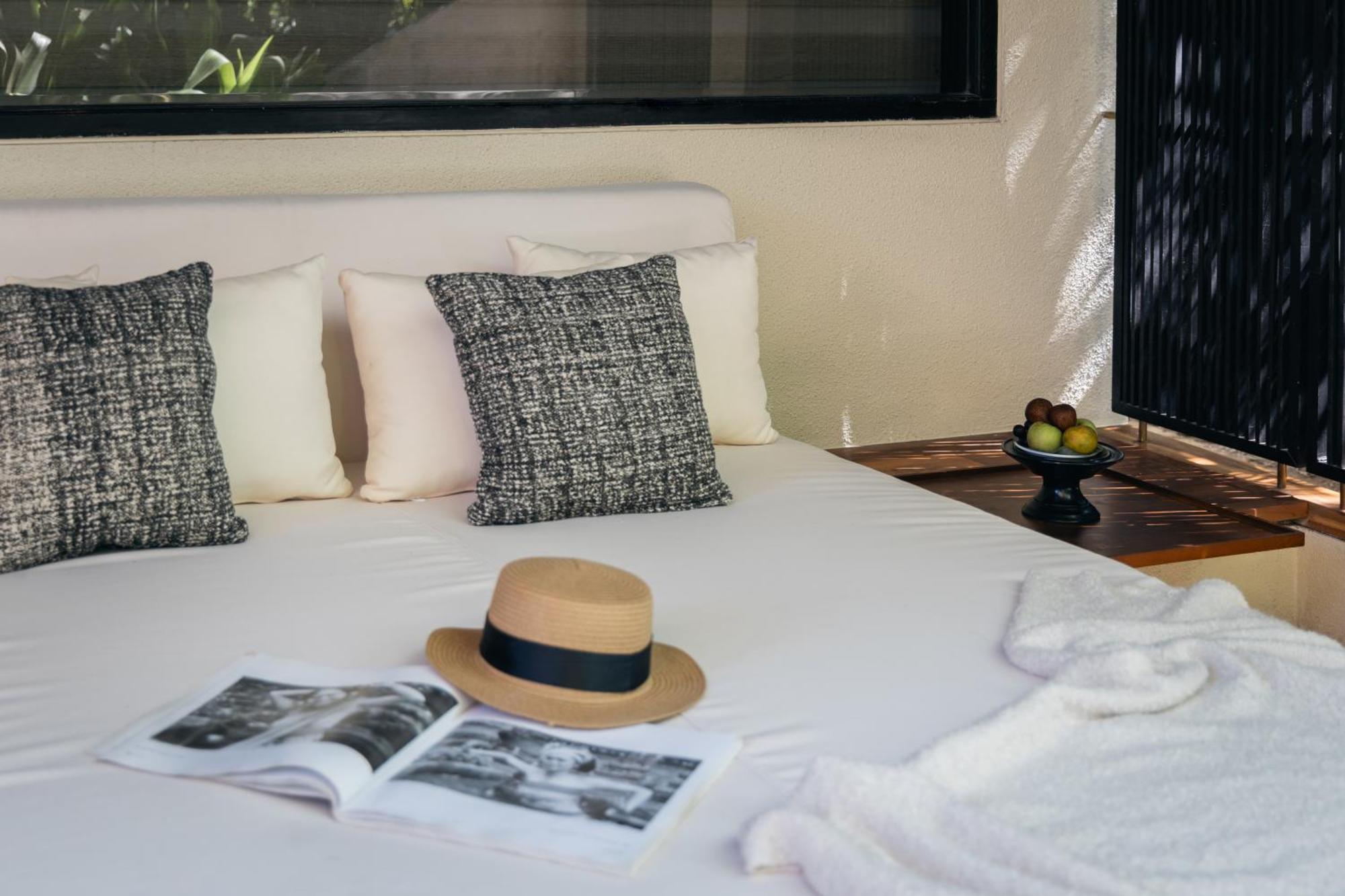 صدارة بوتيك بيتش ريزورت نوسا دوا المظهر الخارجي الصورة A bedroom at the hotel