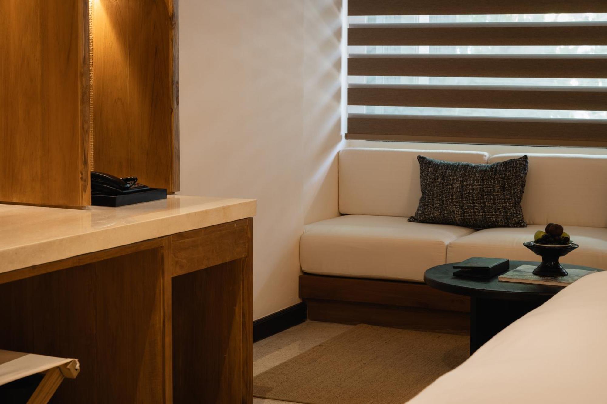 صدارة بوتيك بيتش ريزورت نوسا دوا المظهر الخارجي الصورة A room at the hotel