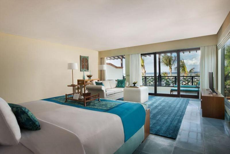 صدارة بوتيك بيتش ريزورت نوسا دوا الغرفة الصورة Deluxe Ocean View Room